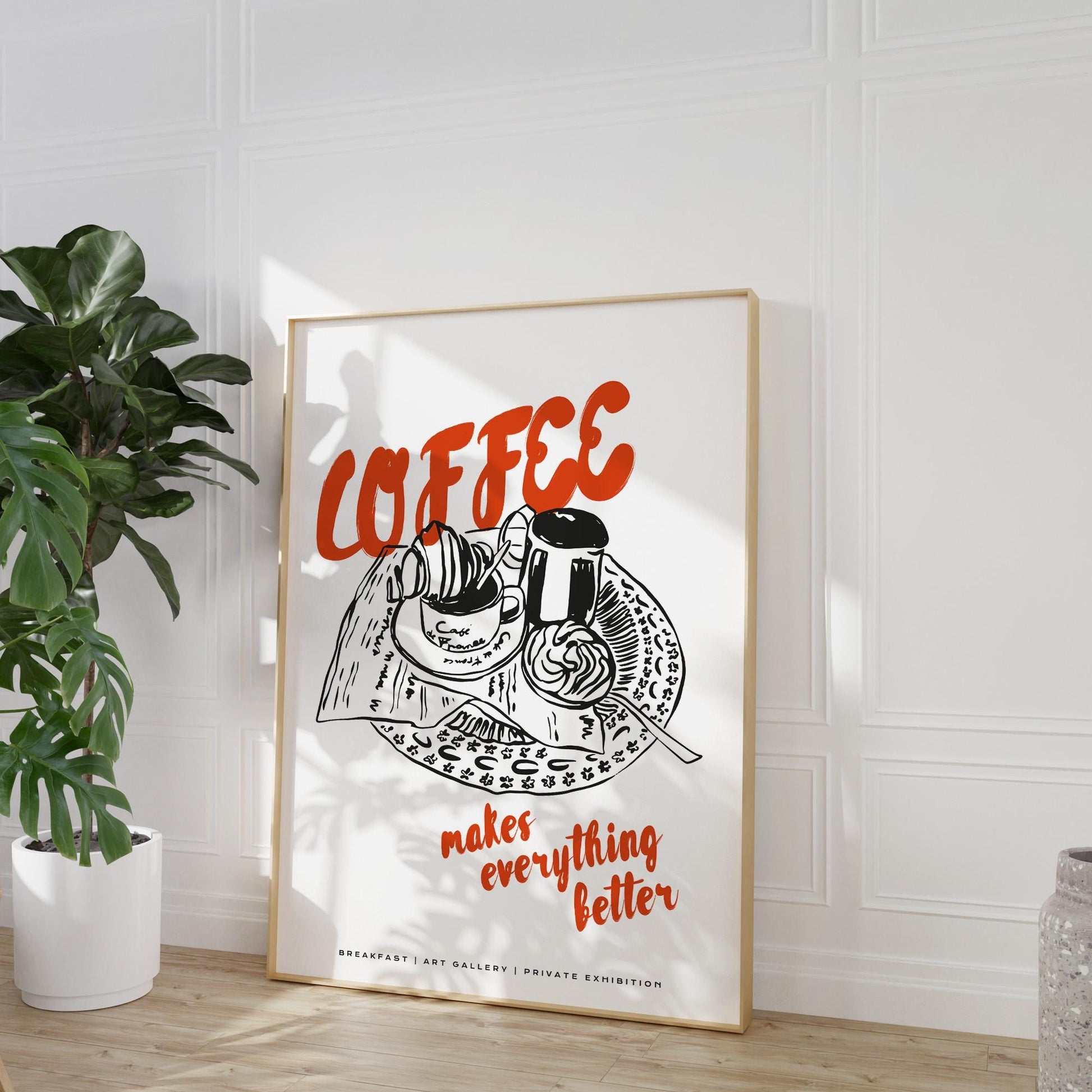 Breakfast nook wall art featuring coffee and croissant on decorative plate